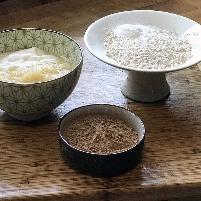 home made carob pupcakes with peanut butter yogurt frosting