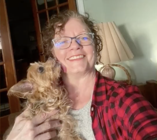 Yorkie Kissing Mom