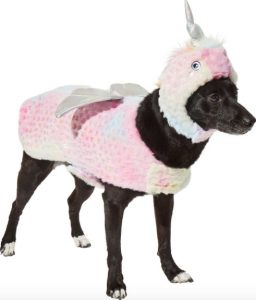 dog wearing pink and white two-piece horned pegasus costume