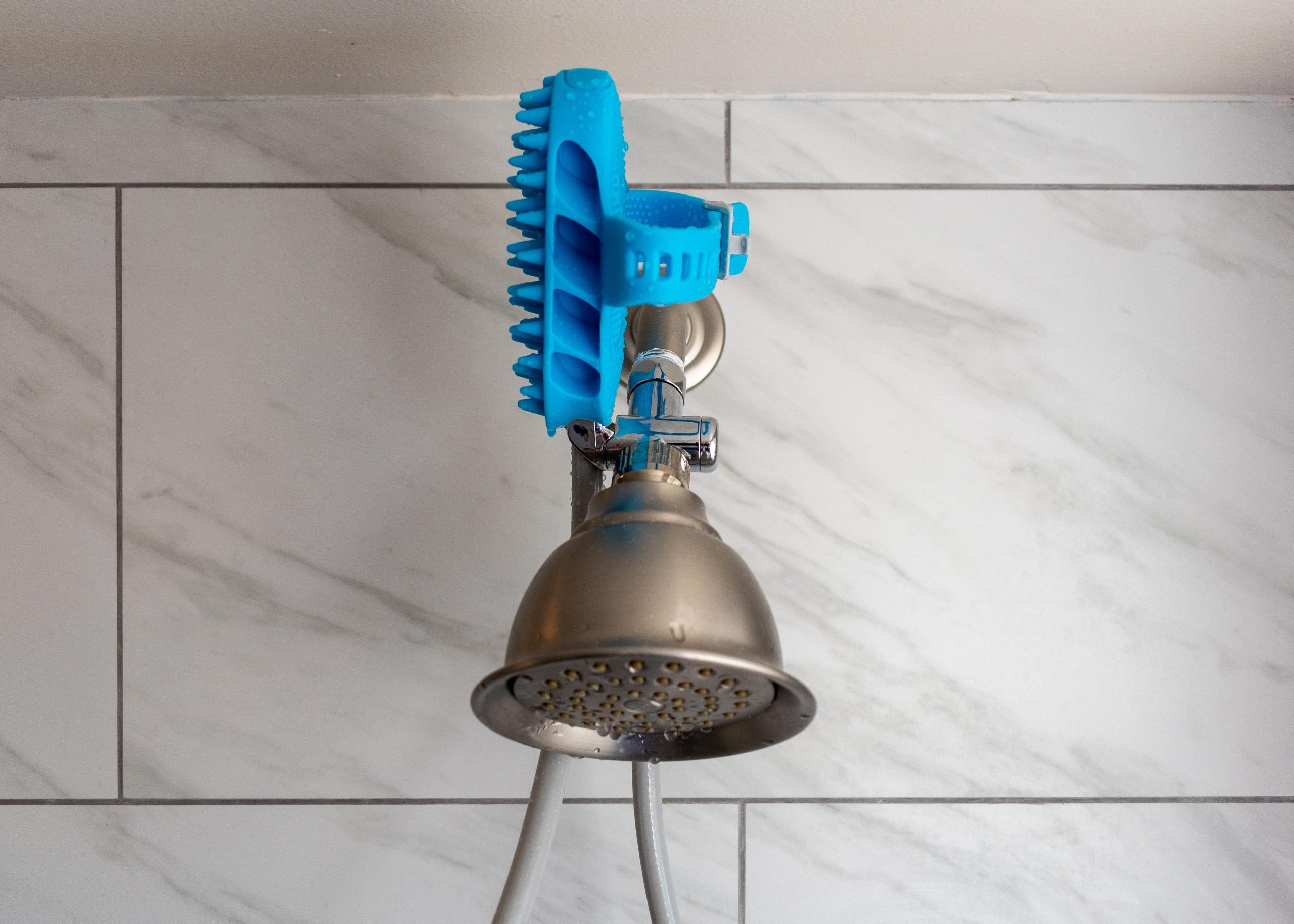 Aquapaw installed on shower head