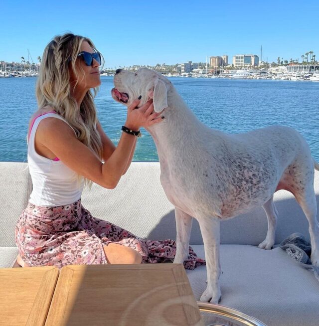 Christina Haack Cuddling Dog on Boat